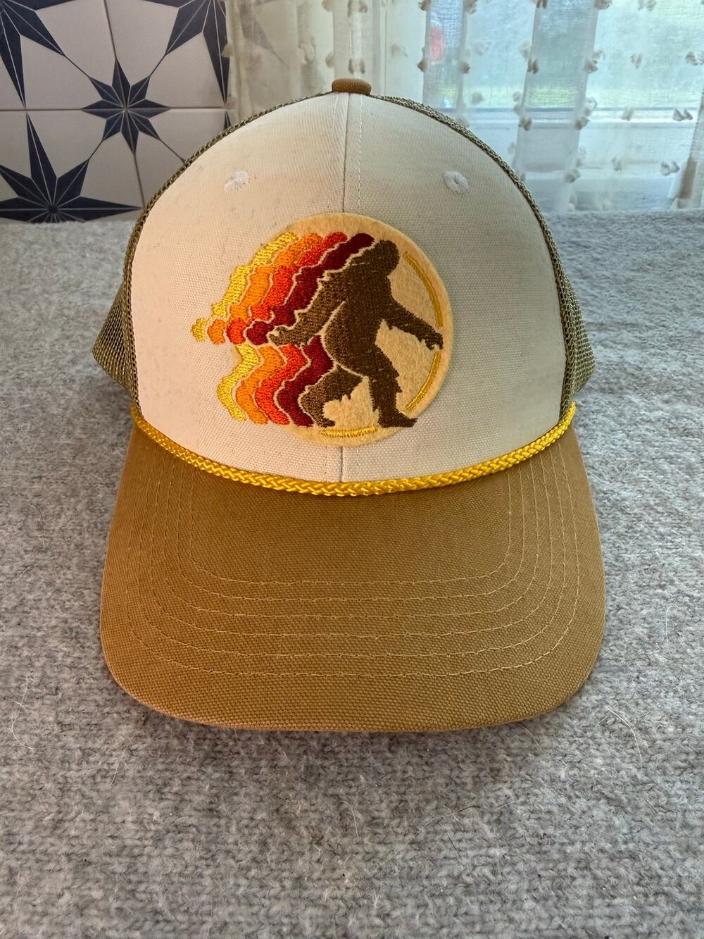 Outdoor Cap Bigfoot Sasquatch Patch Trucker Hat Tan Gold Snapback Rope Accent